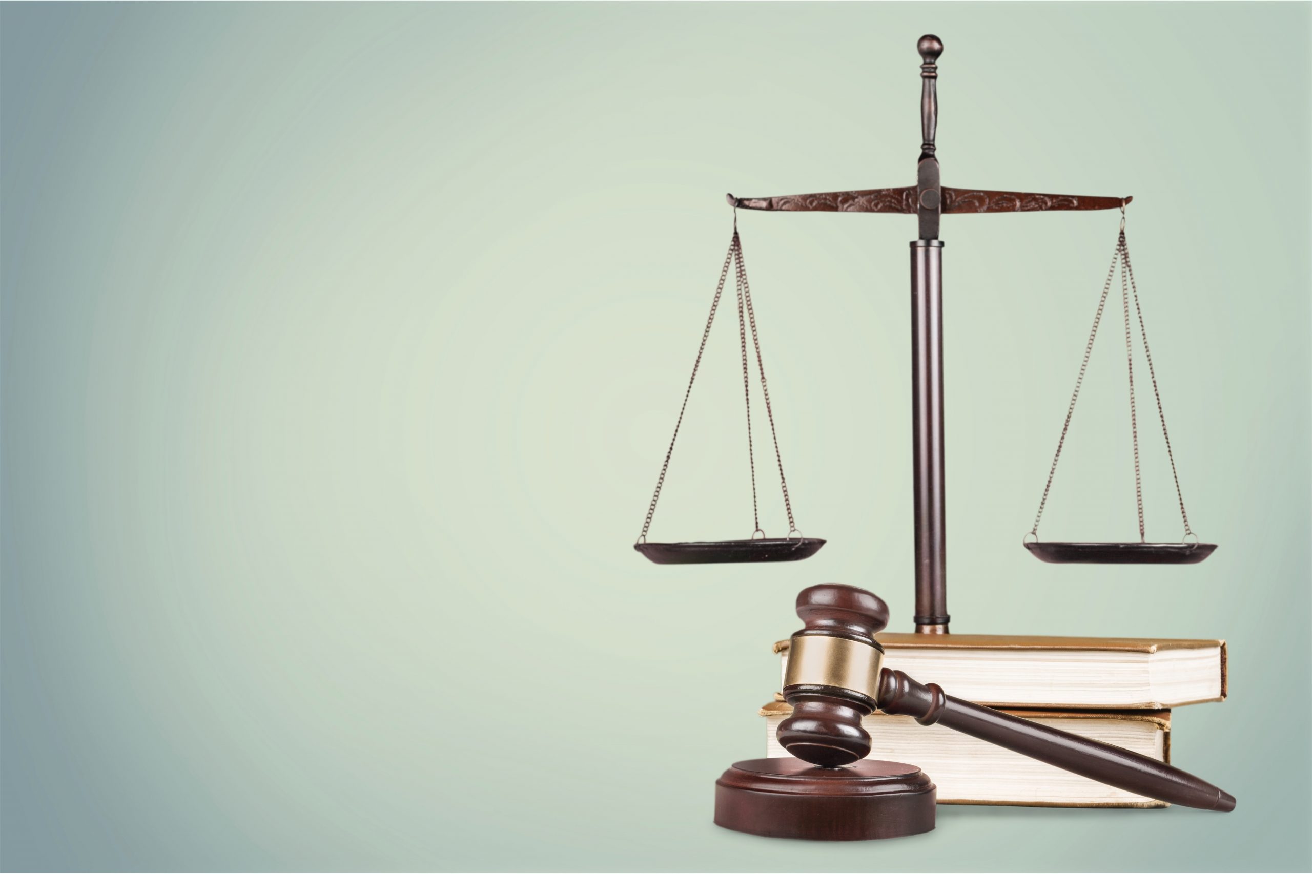 Justice Scales and books and wooden gavel